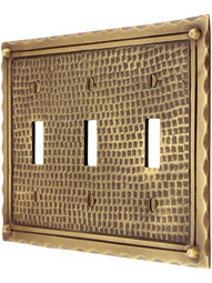 Bungalow Style Triple Toggle Switch Plate In Antique Brass.